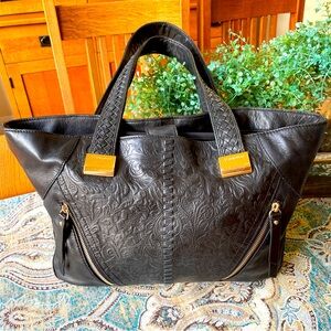 B. Makowsky black tooled leather shoulder bag brass tote